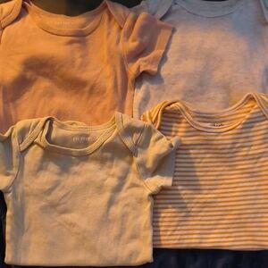 Set of Four Baby Onesies in Pastel and Stripes